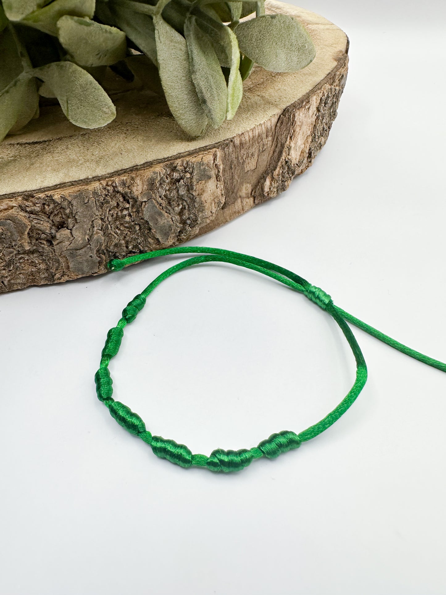 Pulsera verde de los 7 nudos