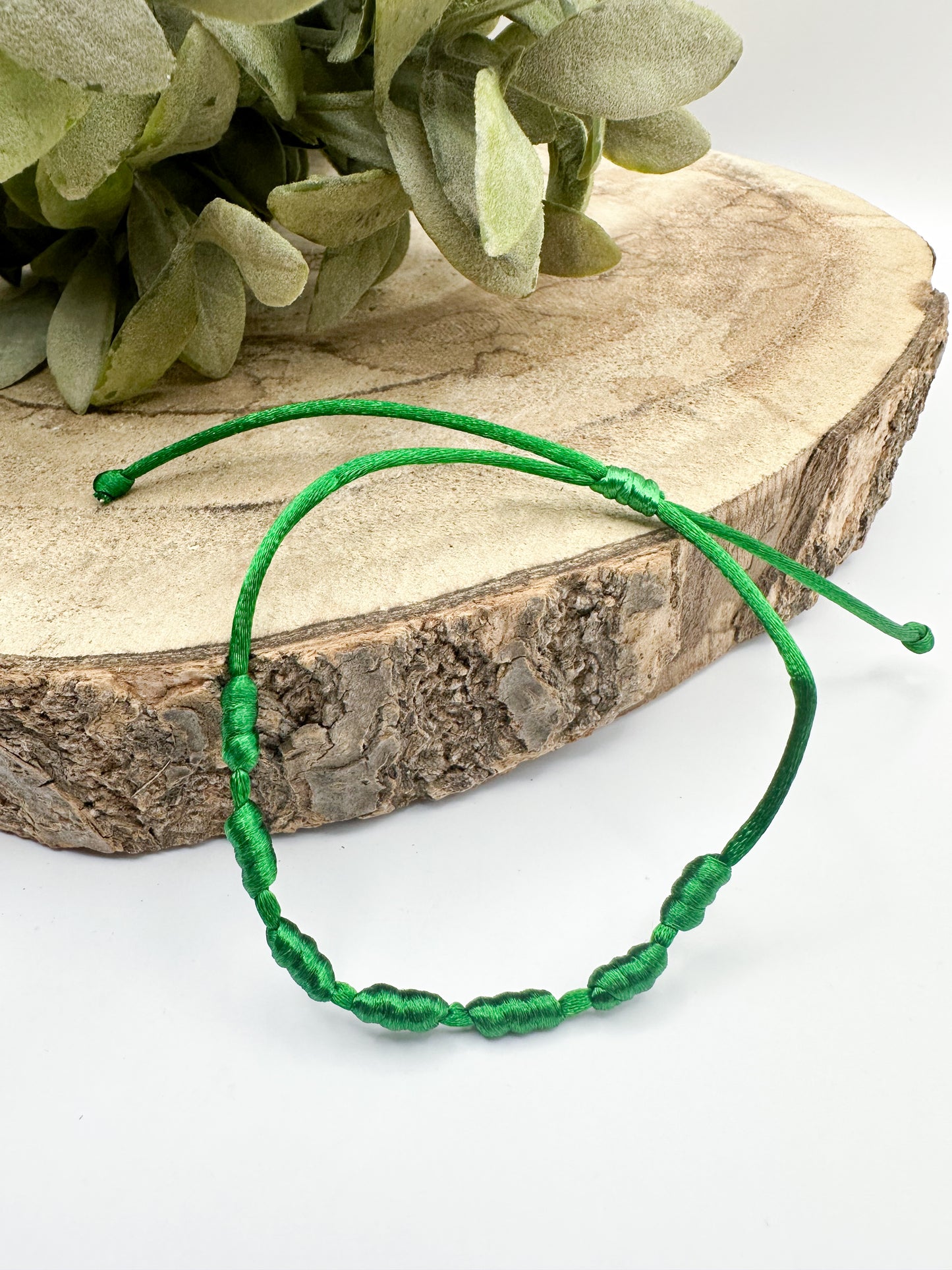 Pulsera verde de los 7 nudos