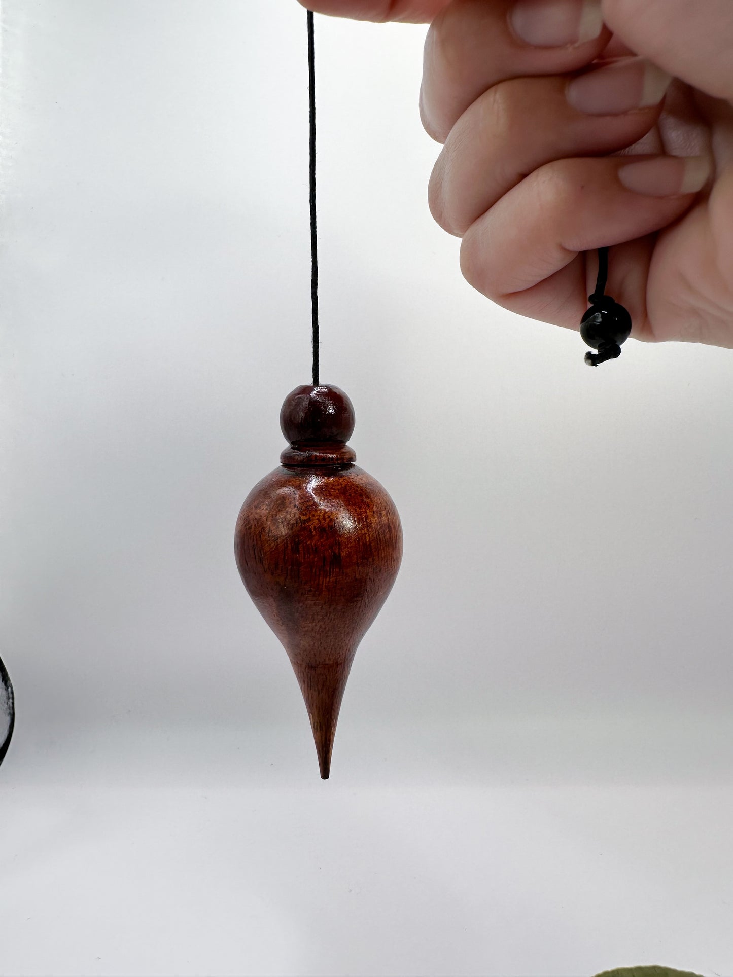 Péndulo lágrima madera